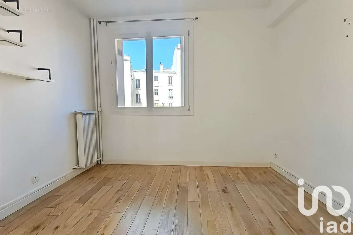 Photo 9 - Appartement à COURBEVOIE