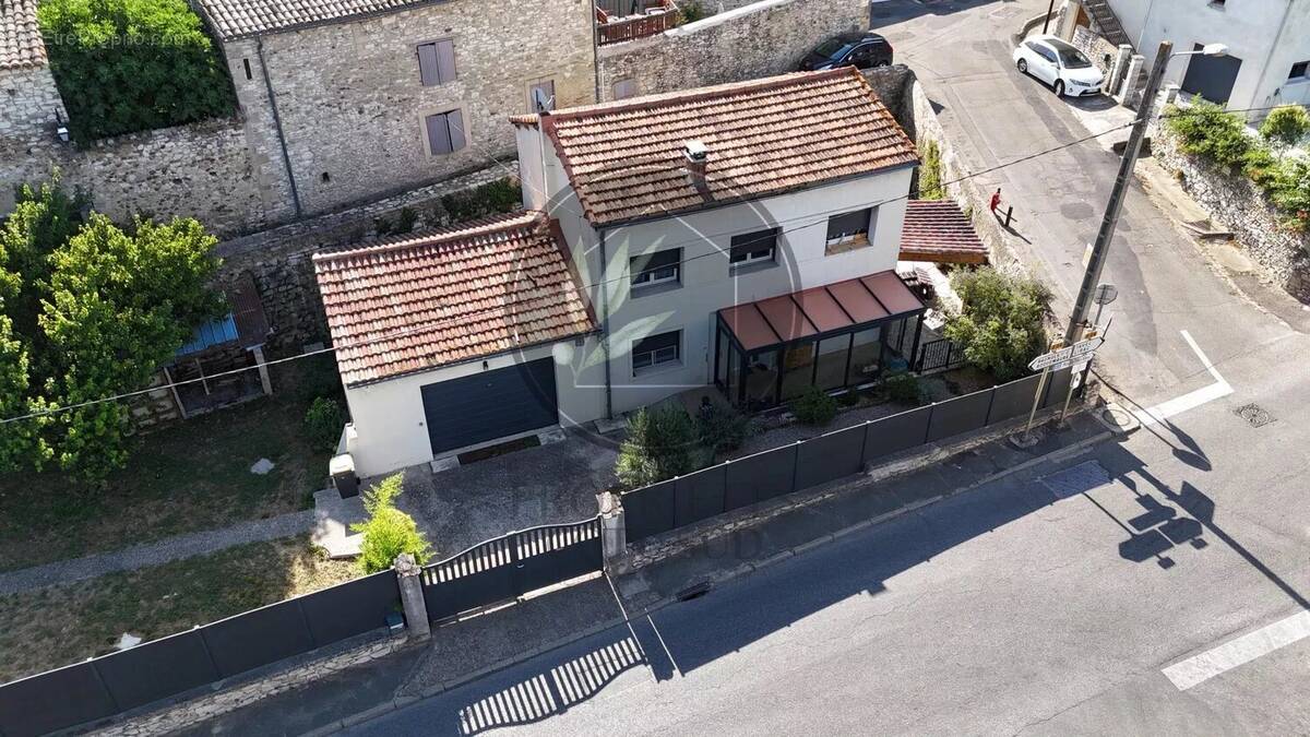 Maison à SAINT-LAURENT-DES-ARBRES