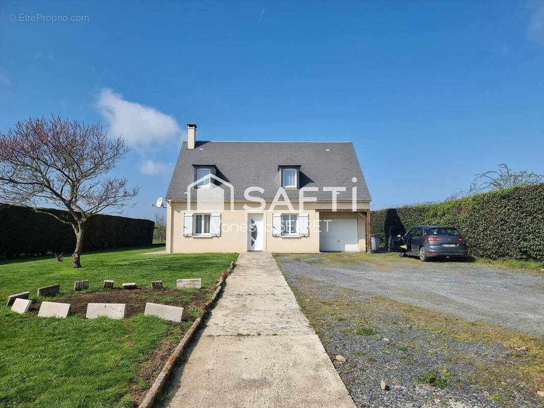 Photo 1 - Maison à PORT-EN-BESSIN-HUPPAIN