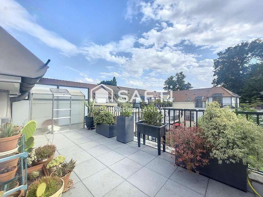 Photo 3 - Appartement à LE MESNIL-SAINT-DENIS