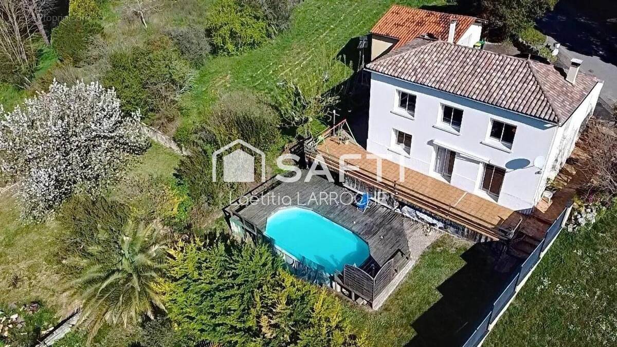 Photo 1 - Maison à CASTELNAU-SUR-GUPIE