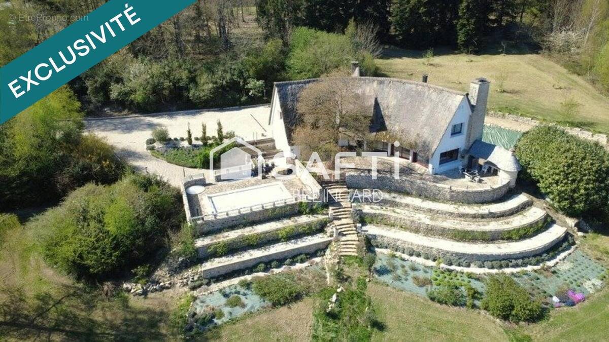 Photo 1 - Maison à SAINT-LEONARD-DE-NOBLAT