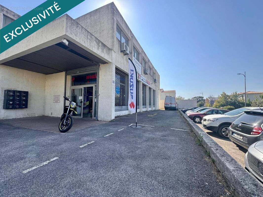 Photo 1 - Commerce à VENELLES