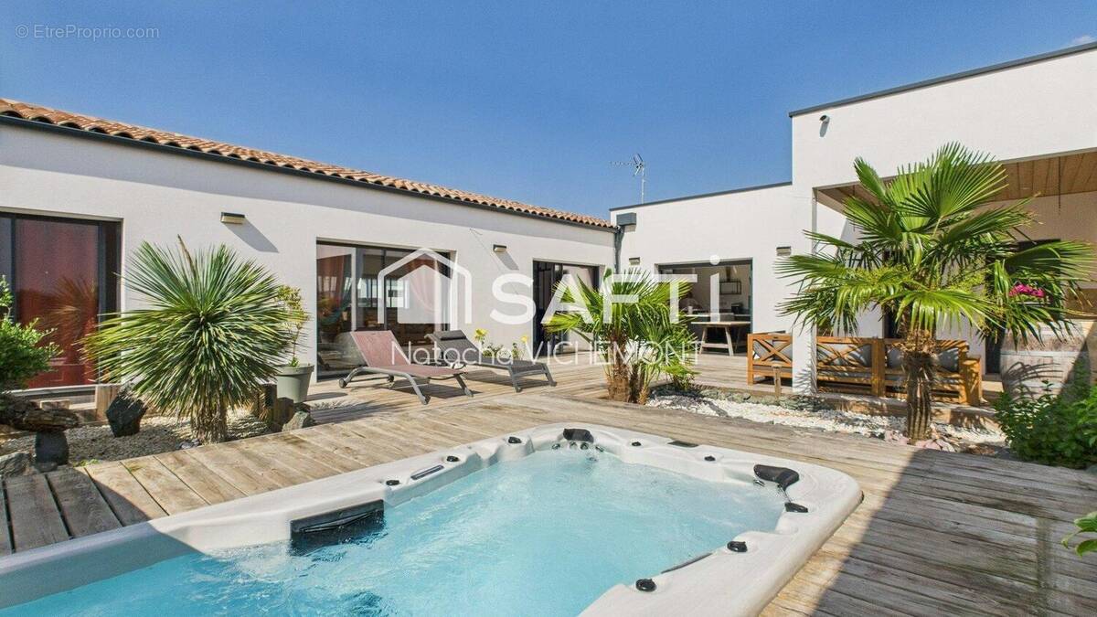 Photo 1 - Maison à ANGOULINS