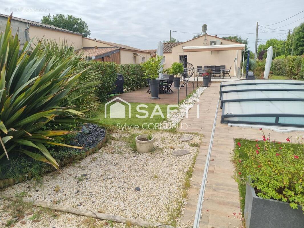 Photo 1 - Maison à SAINT-ROMAIN-DE-BENET