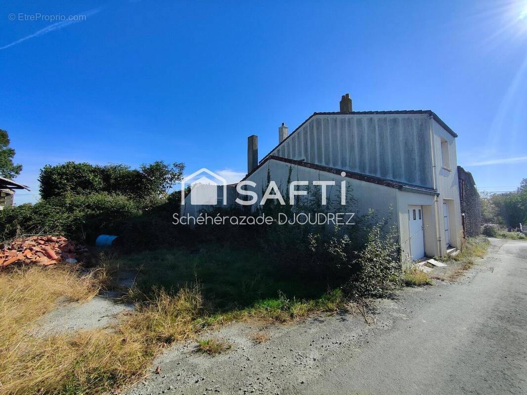 Photo 1 - Maison à LES BROUZILS