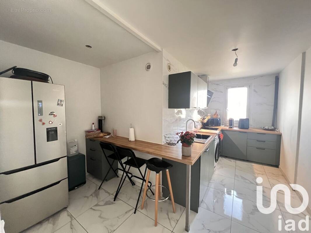 Photo 1 - Appartement à SAVIGNY-LE-TEMPLE