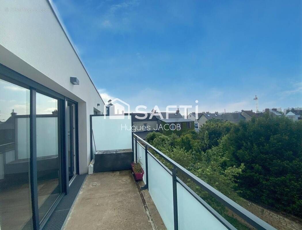 Photo 1 - Appartement à CAEN