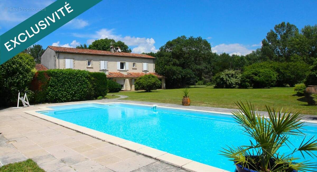 Photo 1 - Maison à LABRUGUIERE