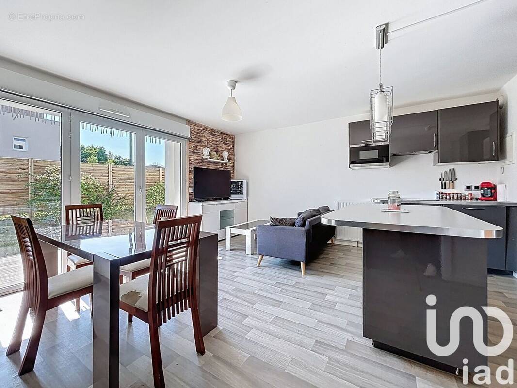 Photo 1 - Appartement à CHARTRES-DE-BRETAGNE