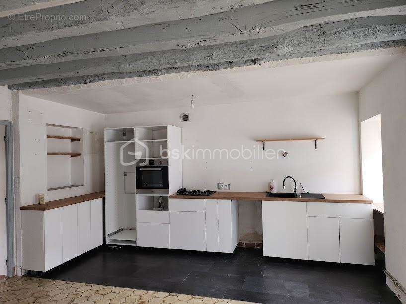 Maison à COMBOURTILLE