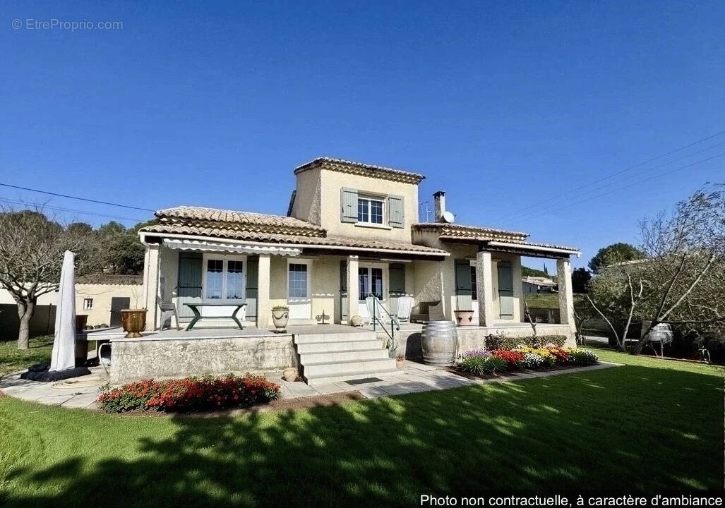 Maison à LAUDUN-L&#039;ARDOISE