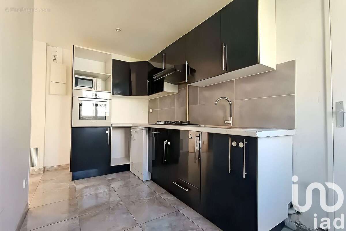 Photo 4 - Appartement à COURBEVOIE