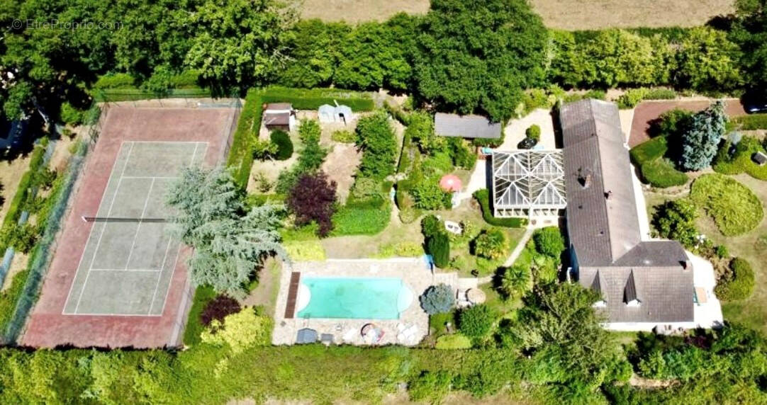 Maison à CONDE-SUR-HUISNE