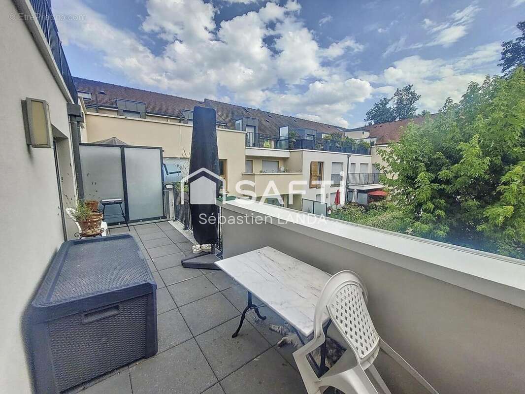 Photo 8 - Appartement à LE MESNIL-SAINT-DENIS