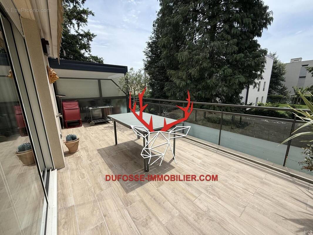 Photo 1 - Appartement à TASSIN-LA-DEMI-LUNE