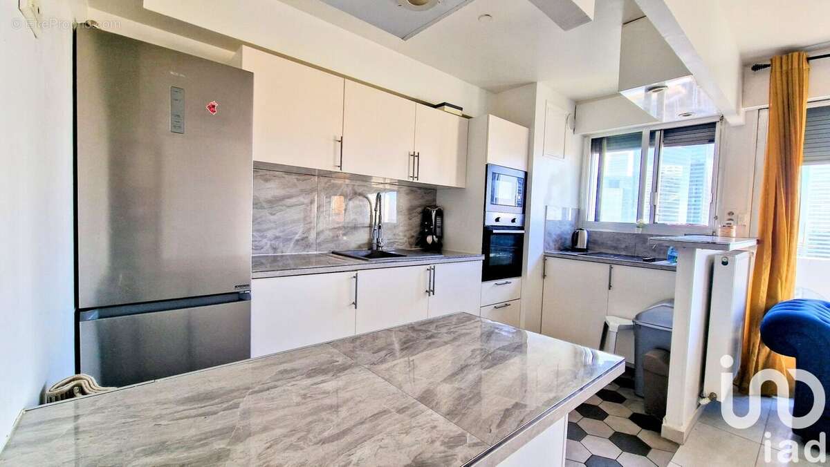 Photo 3 - Appartement à COURBEVOIE