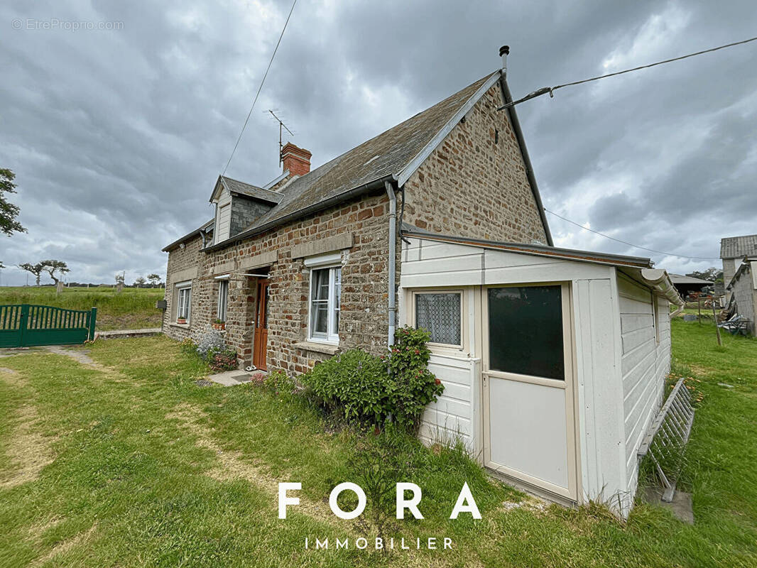 Maison à CONDE-SUR-NOIREAU