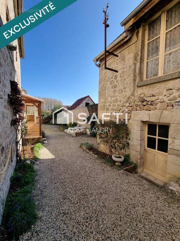 Photo 1 - Maison à BOURG-ET-COMIN