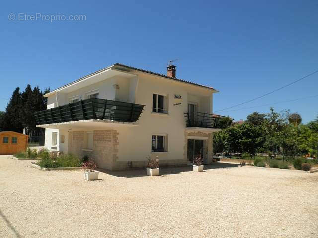 Maison à LAUDUN-L&#039;ARDOISE