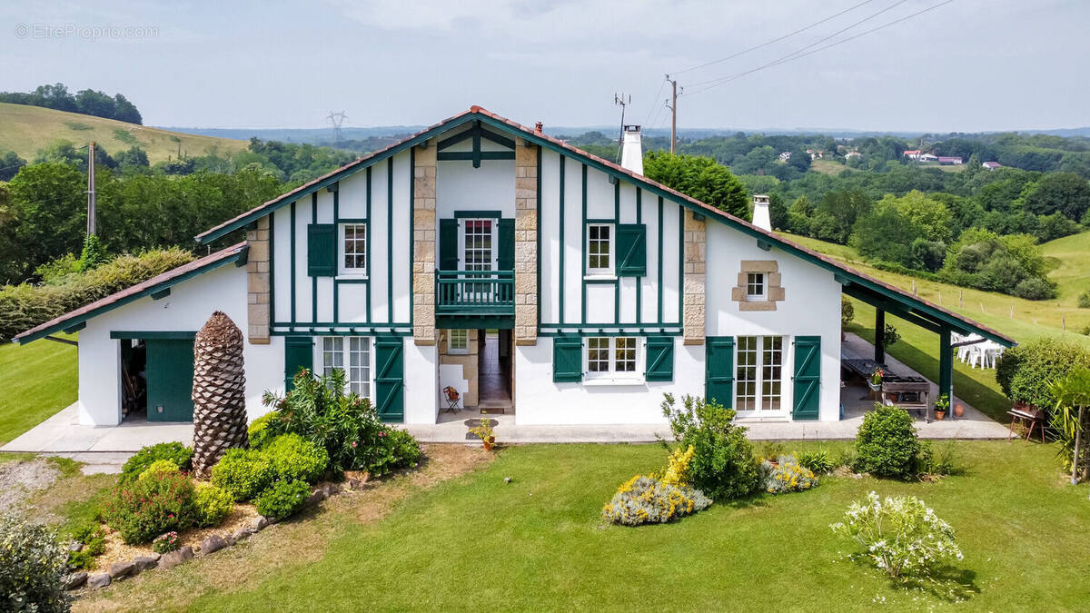 Photo 1 - Maison à BRISCOUS