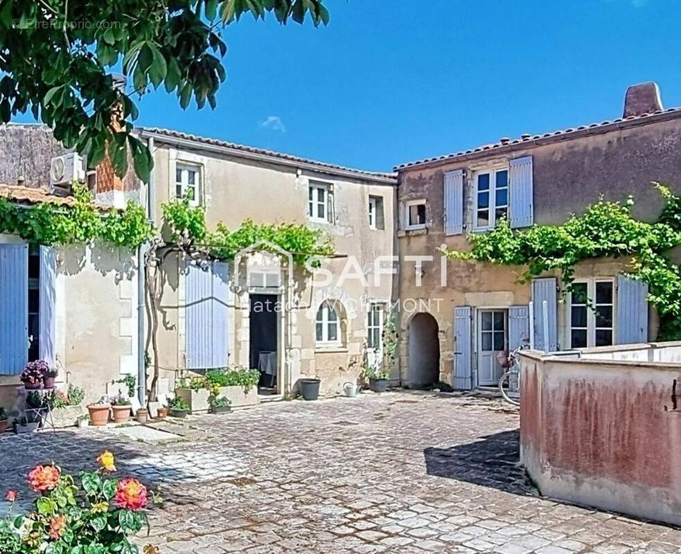 Photo 1 - Maison à ANGOULINS