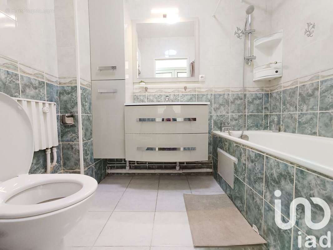 Photo 7 - Appartement à PARIS-19E