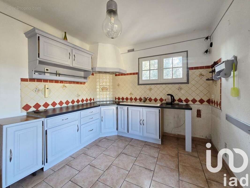 Photo 4 - Maison à LAUDUN-L&#039;ARDOISE