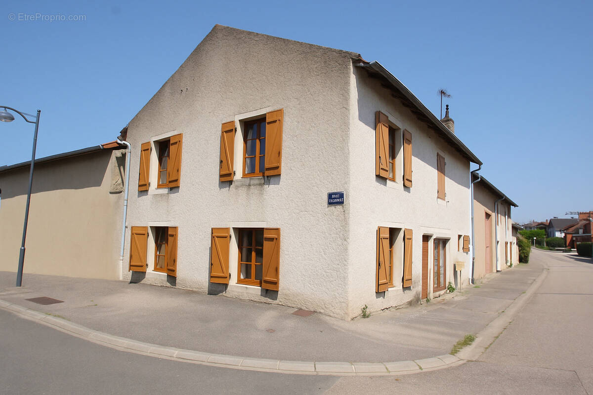 Maison à LOUVIGNY