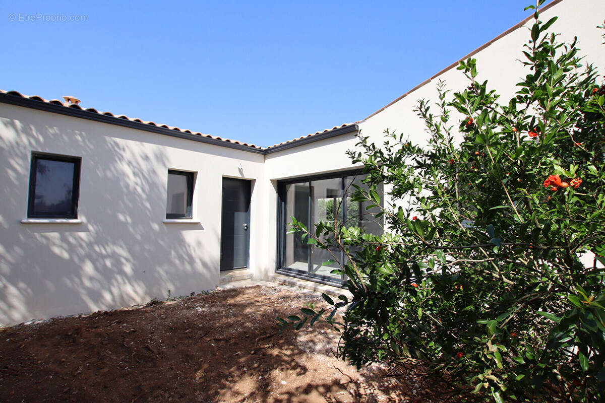 Maison à VOUILLE