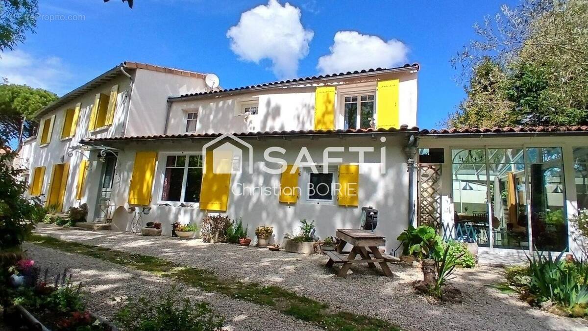 Photo 1 - Maison à SAINT-ROMAIN-DE-BENET