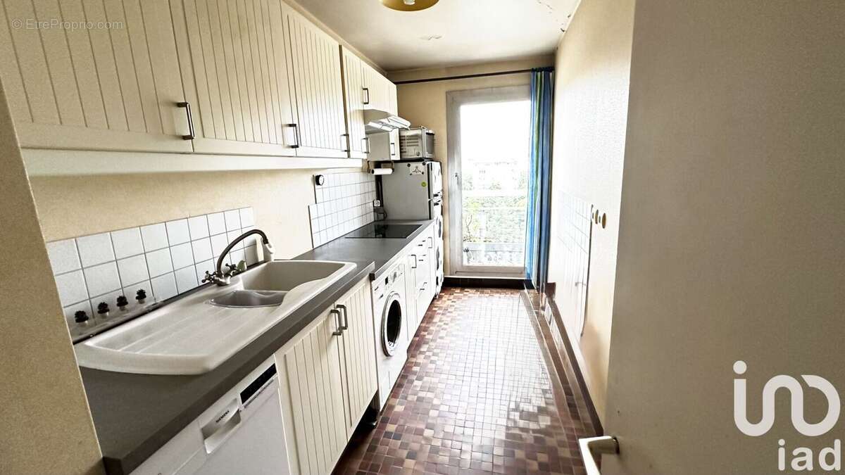 Photo 4 - Appartement à COURBEVOIE