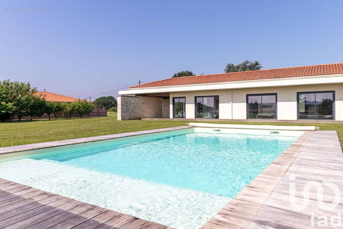 Photo 1 - Maison à POMMEVIC