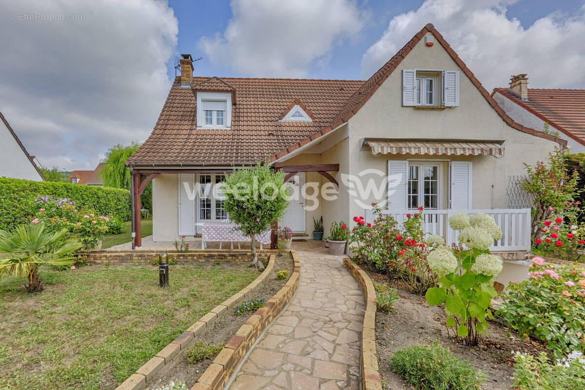 Maison à CHANTELOUP-LES-VIGNES