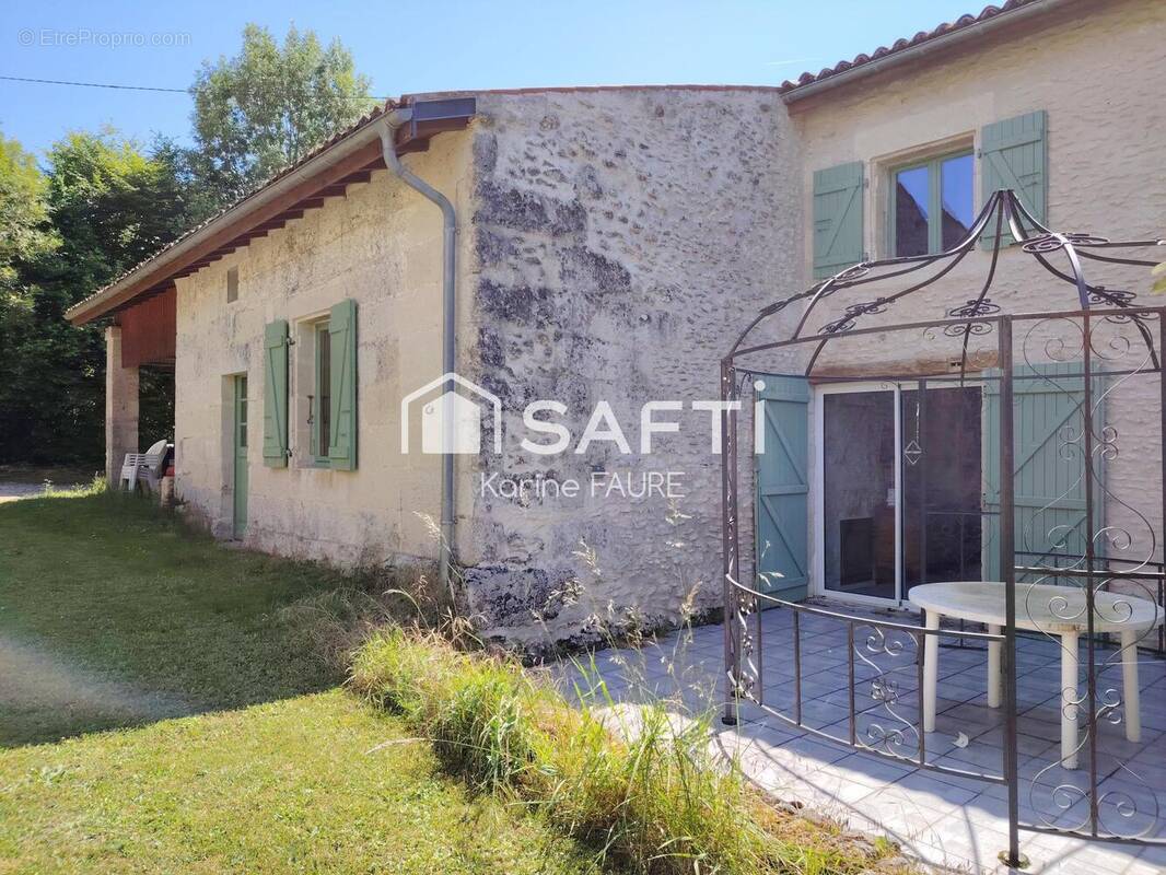 Photo 1 - Maison à LA CHAPELLE-DES-POTS
