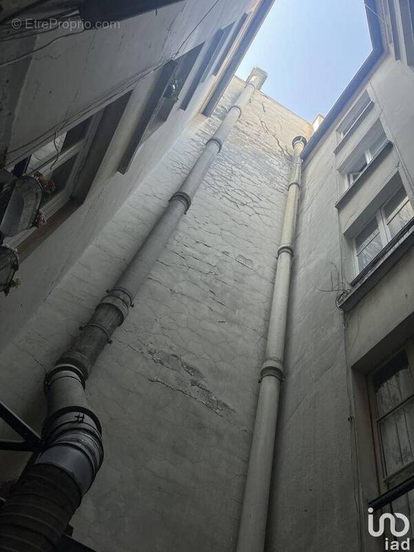Photo 1 - Commerce à PARIS-2E