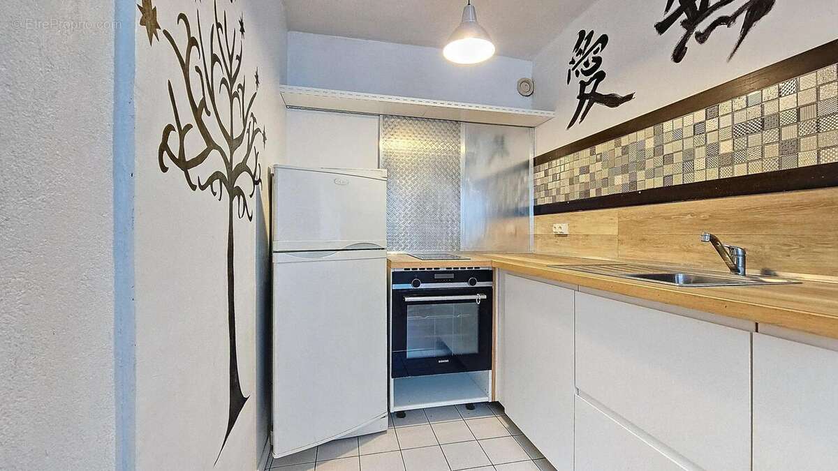 Photo 6 - Appartement à PARIS-18E