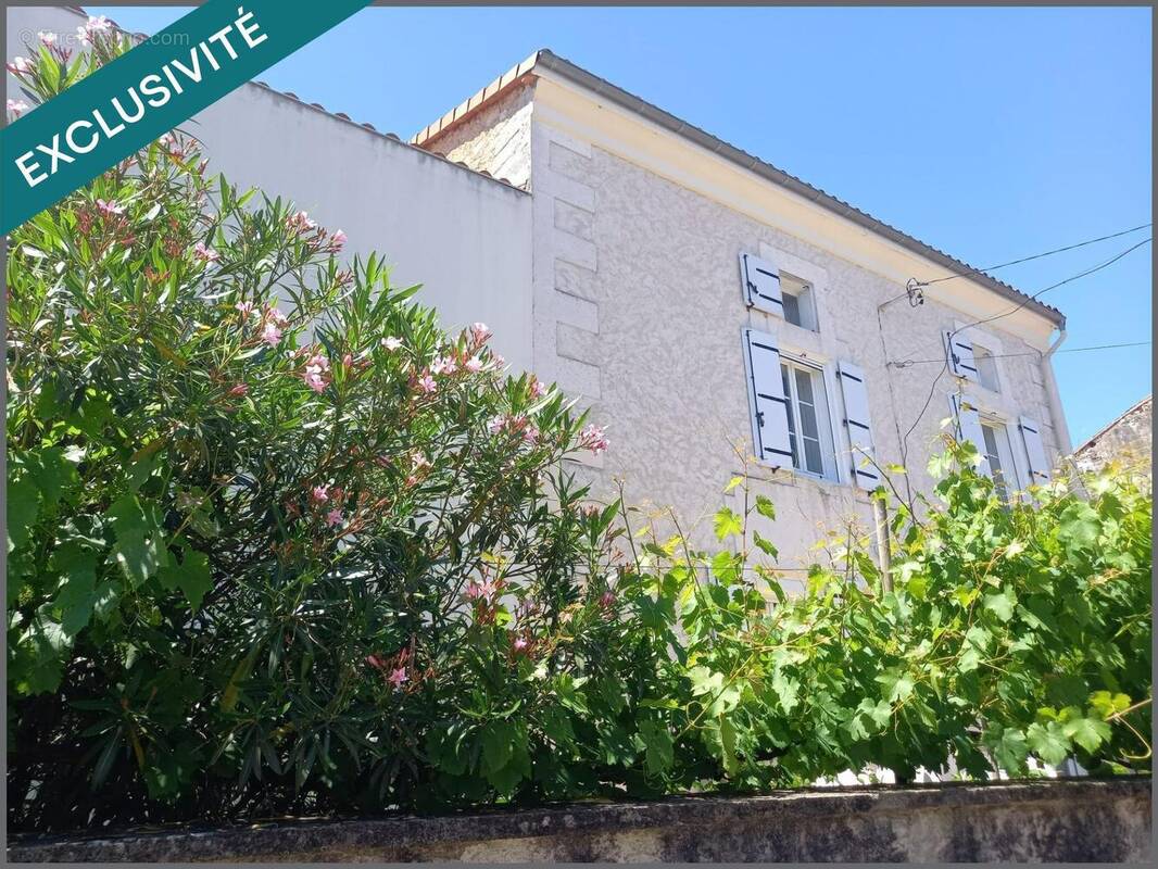 Photo 1 - Maison à CHAMPNIERS