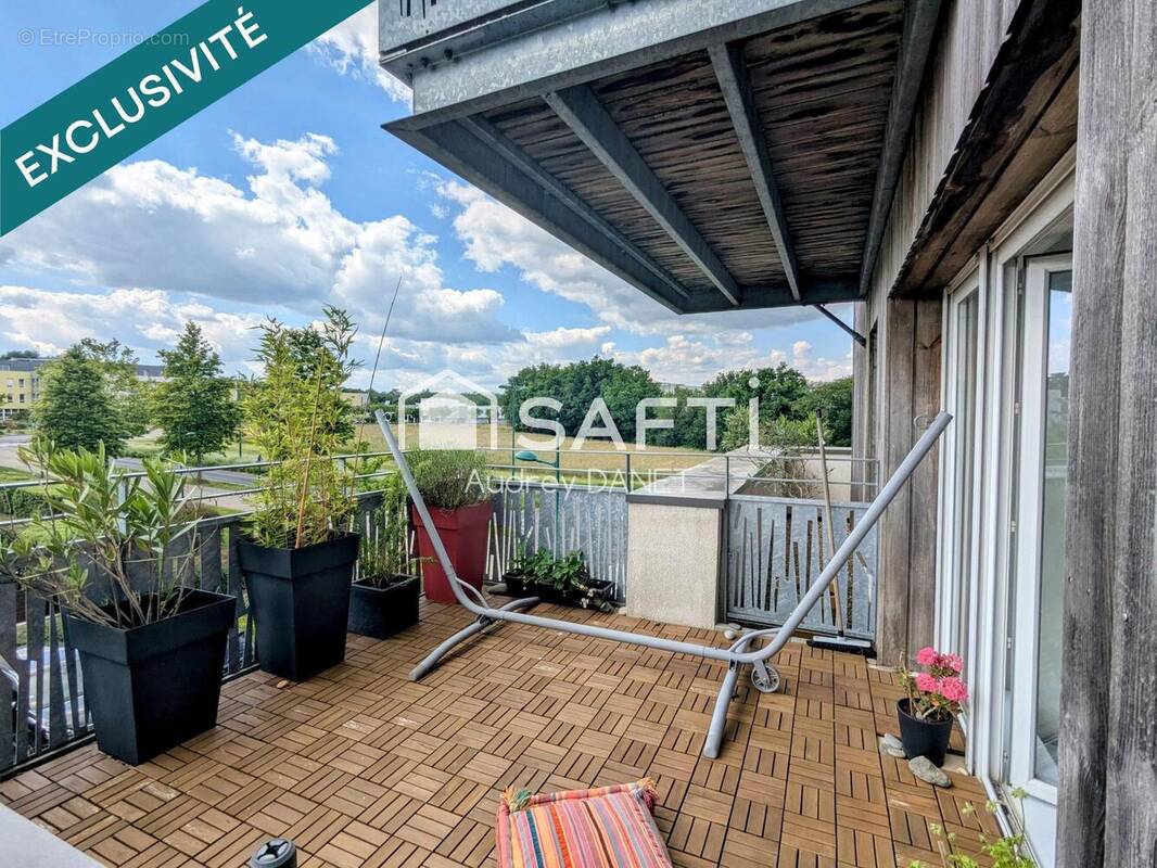 Photo 1 - Appartement à LA CHAPELLE-SUR-ERDRE
