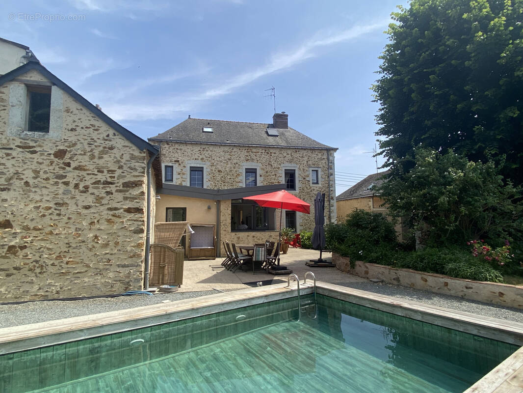 Maison à CHAMPIGNE