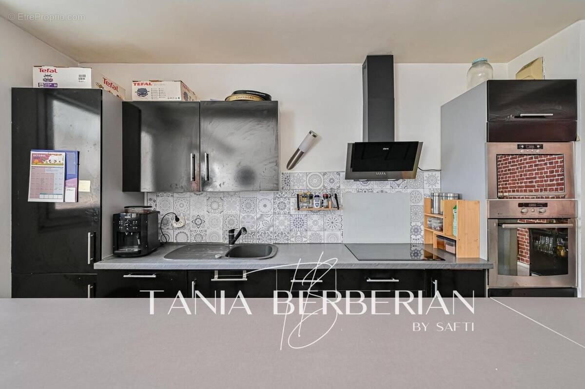 Photo 1 - Appartement à COURBEVOIE