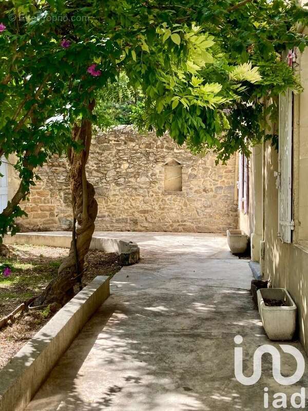 Photo 4 - Maison à LAUDUN-L&#039;ARDOISE