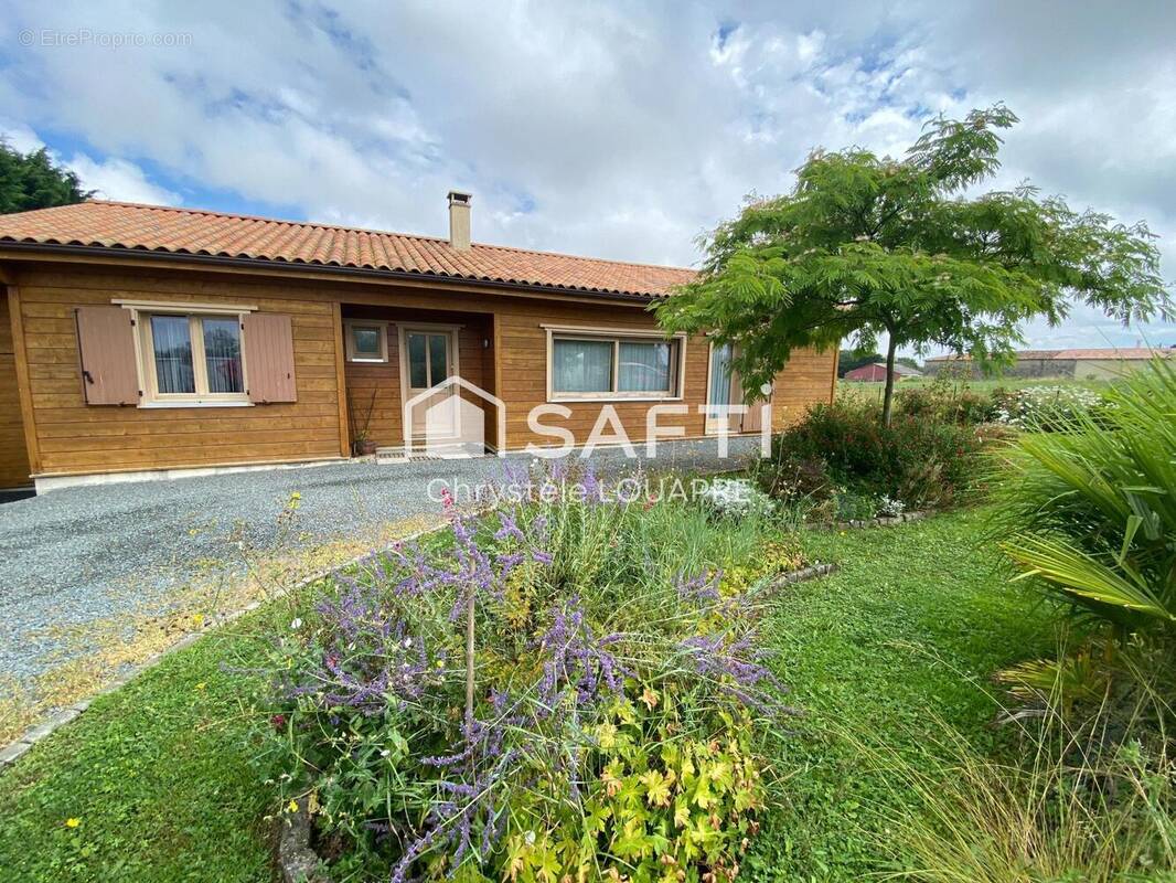 Photo 1 - Maison à ASNIERES-LA-GIRAUD
