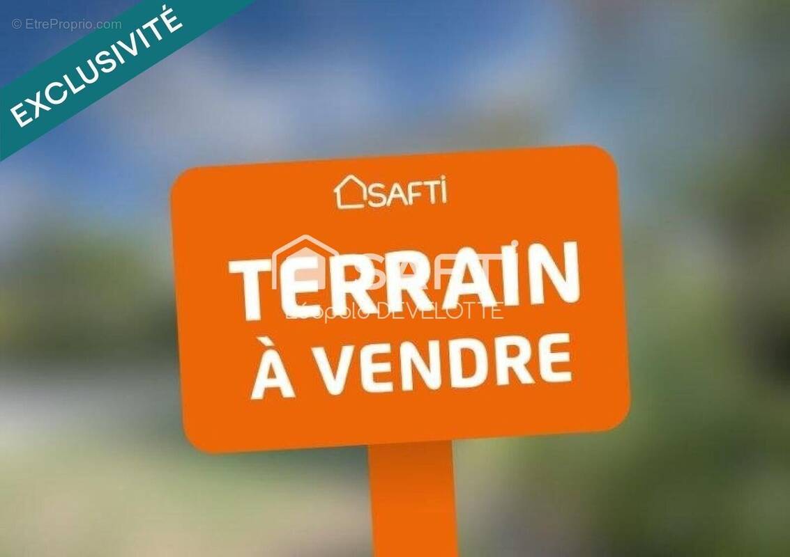 Photo 1 - Terrain à LOUVIGNY