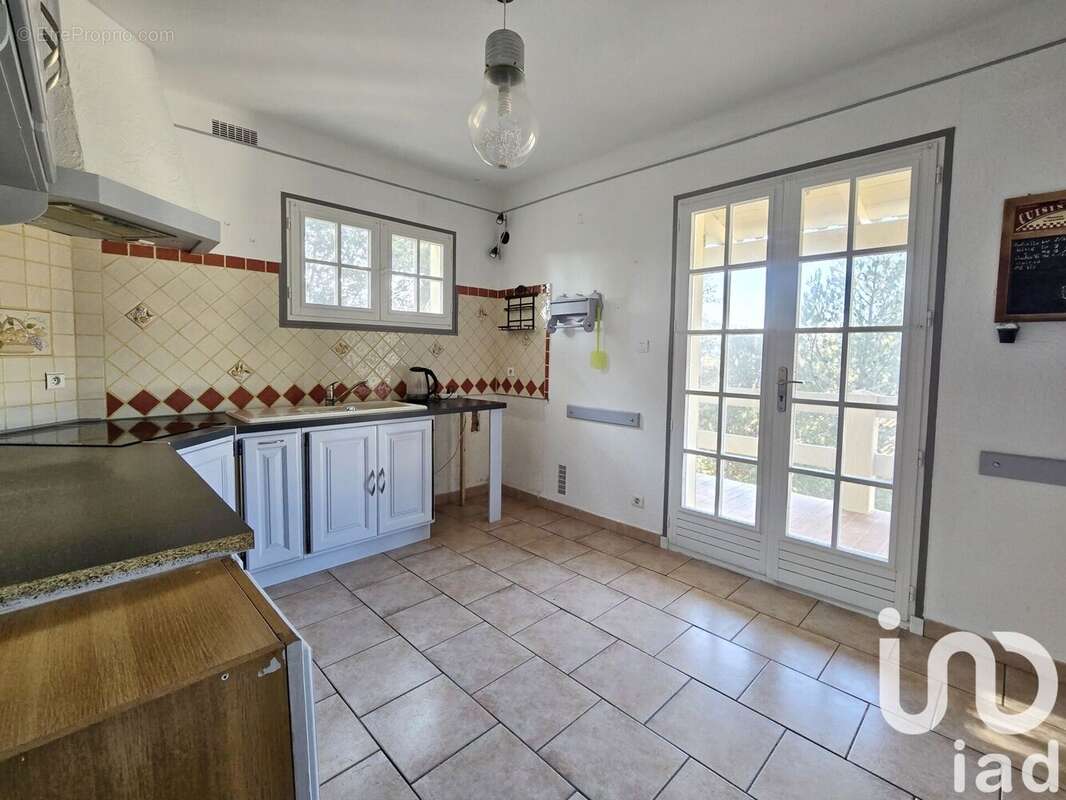 Photo 5 - Maison à LAUDUN-L&#039;ARDOISE